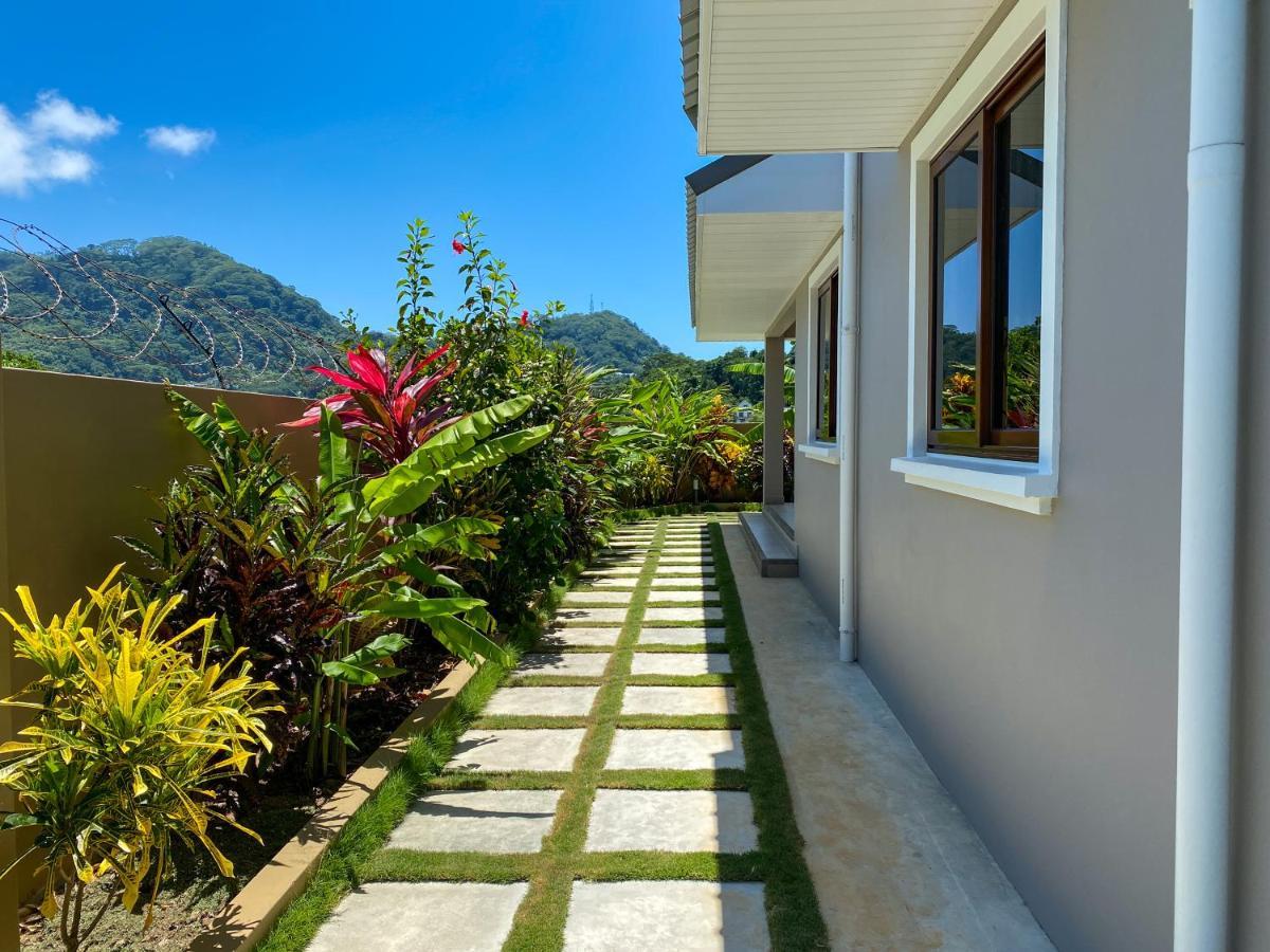 Апартаменты Whispering Palms Бель-Омбр Экстерьер фото