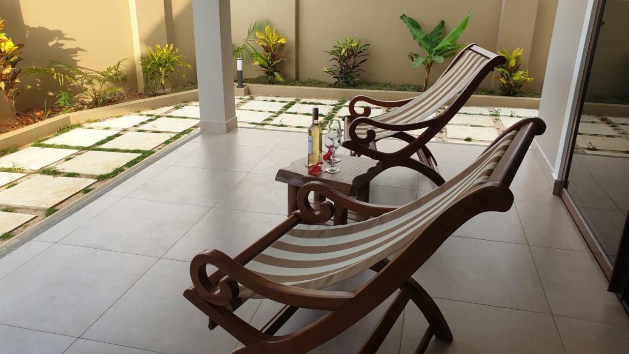 Апартаменты Whispering Palms Бель-Омбр Экстерьер фото
